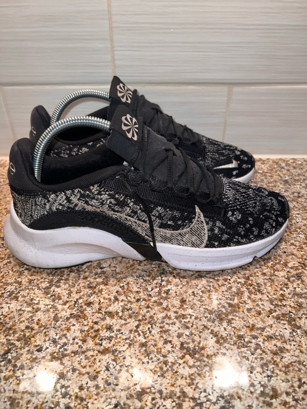 Nike Women's Black and White Knit Running Sneakers